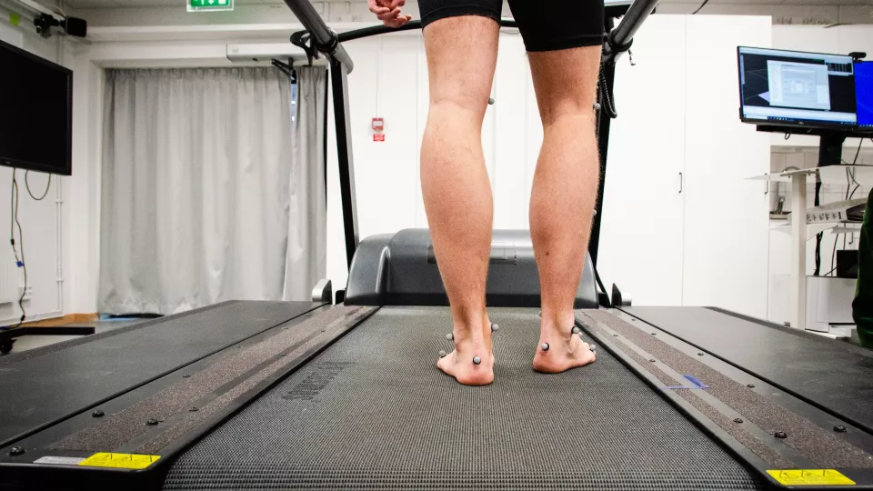 Legs on treadmill gaitway 3d. Photo.